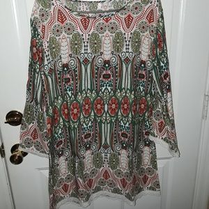 Large dress. Would look great with leggings also.